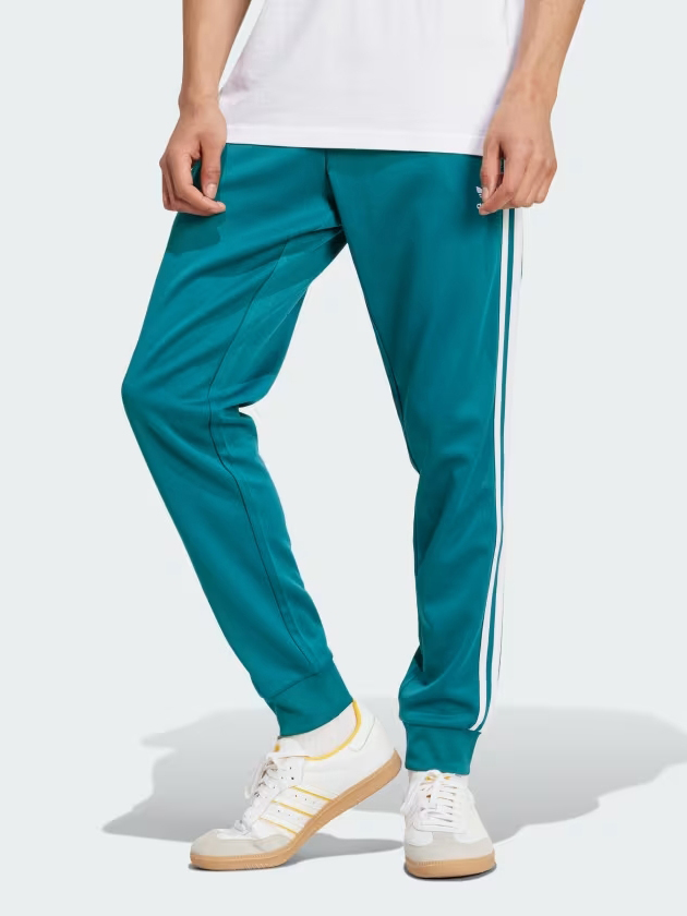 Акція на Спортивні штани чоловічі Adidas Originals Sst Tp IY9862 2XL Бірюзові від Rozetka