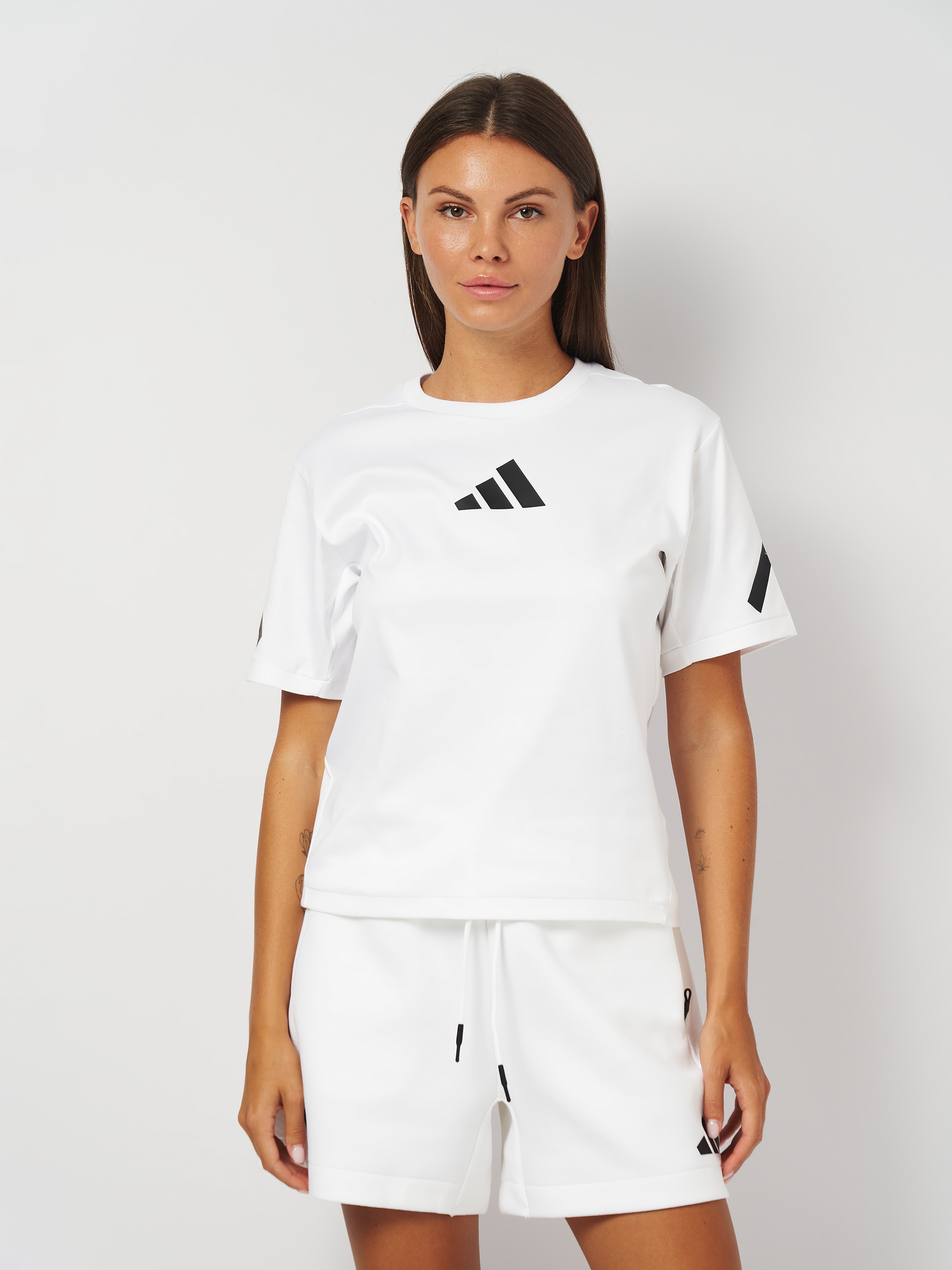 Акція на Футболка бавовняна жіноча Adidas W Z.N.E. Tee JE7857 XS White від Rozetka