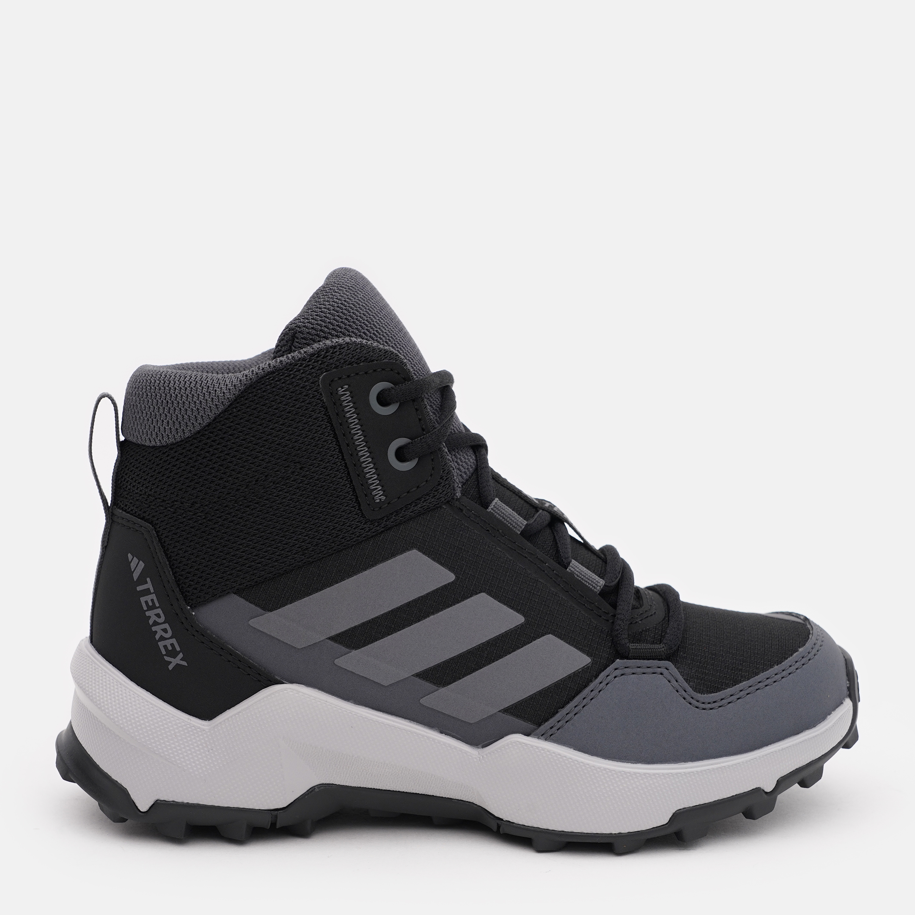 Акція на Дитячі демісезонні черевики для хлопчика Adidas Terrex Ax4R Mid K IF6520 30.5 Чорні від Rozetka