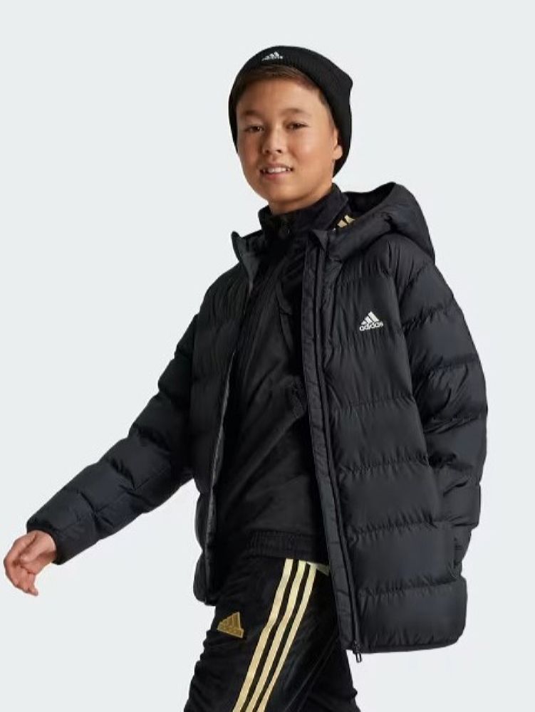 Акція на Підліткова зимова стьобана куртка для хлопчика Adidas J Sd Jkt IV9505 176 см Чорна від Rozetka