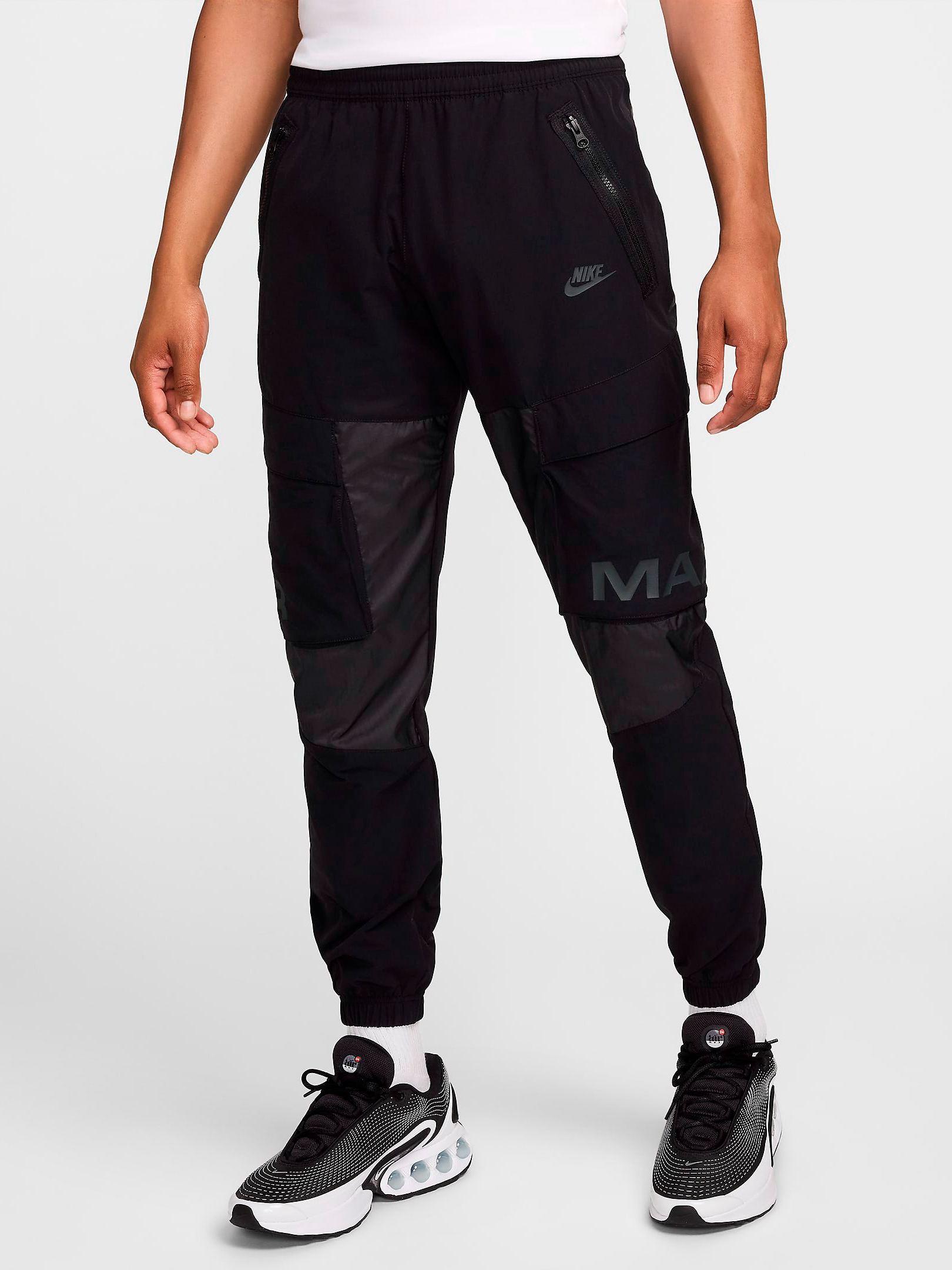 Акція на Спортивні штани чоловічі Nike M Nsw Air Max Wvn Cargo Pant HF6601-010 L Чорні від Rozetka