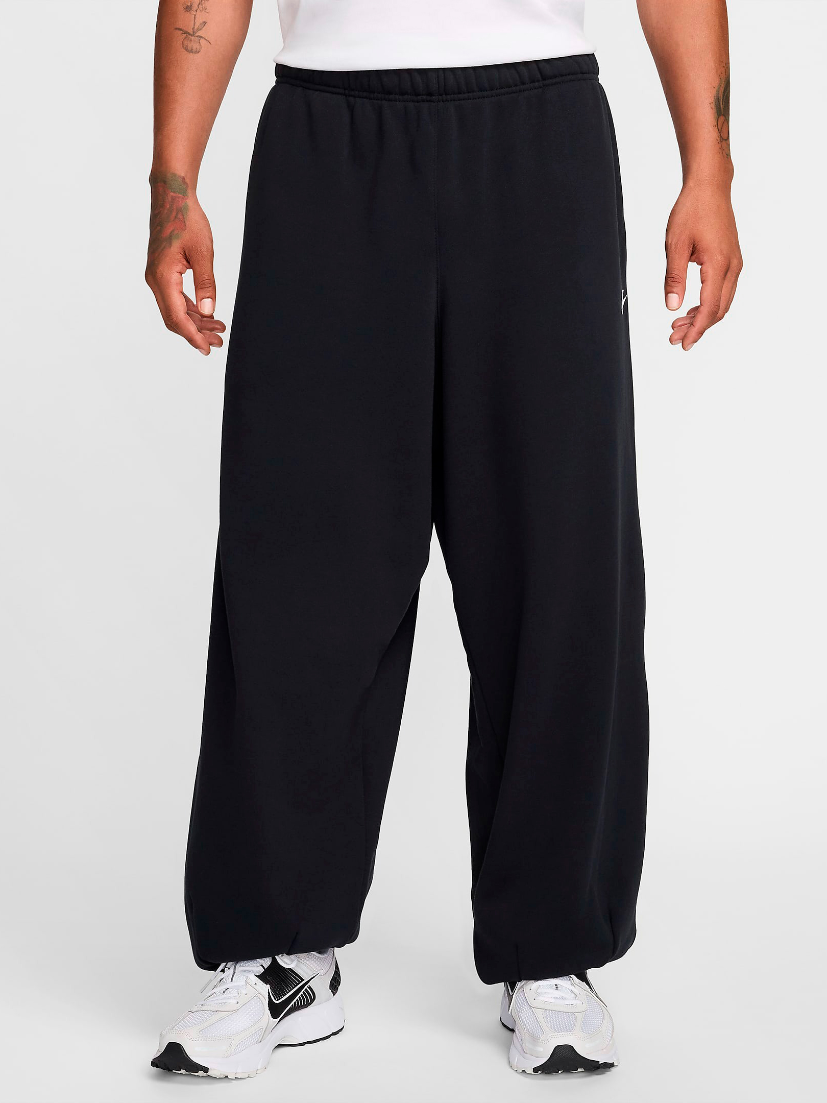 Акція на Спортивні штани утеплені чоловічі Nike M Nk Club Ft Oversized Pant HJ1822-010 L Чорні від Rozetka