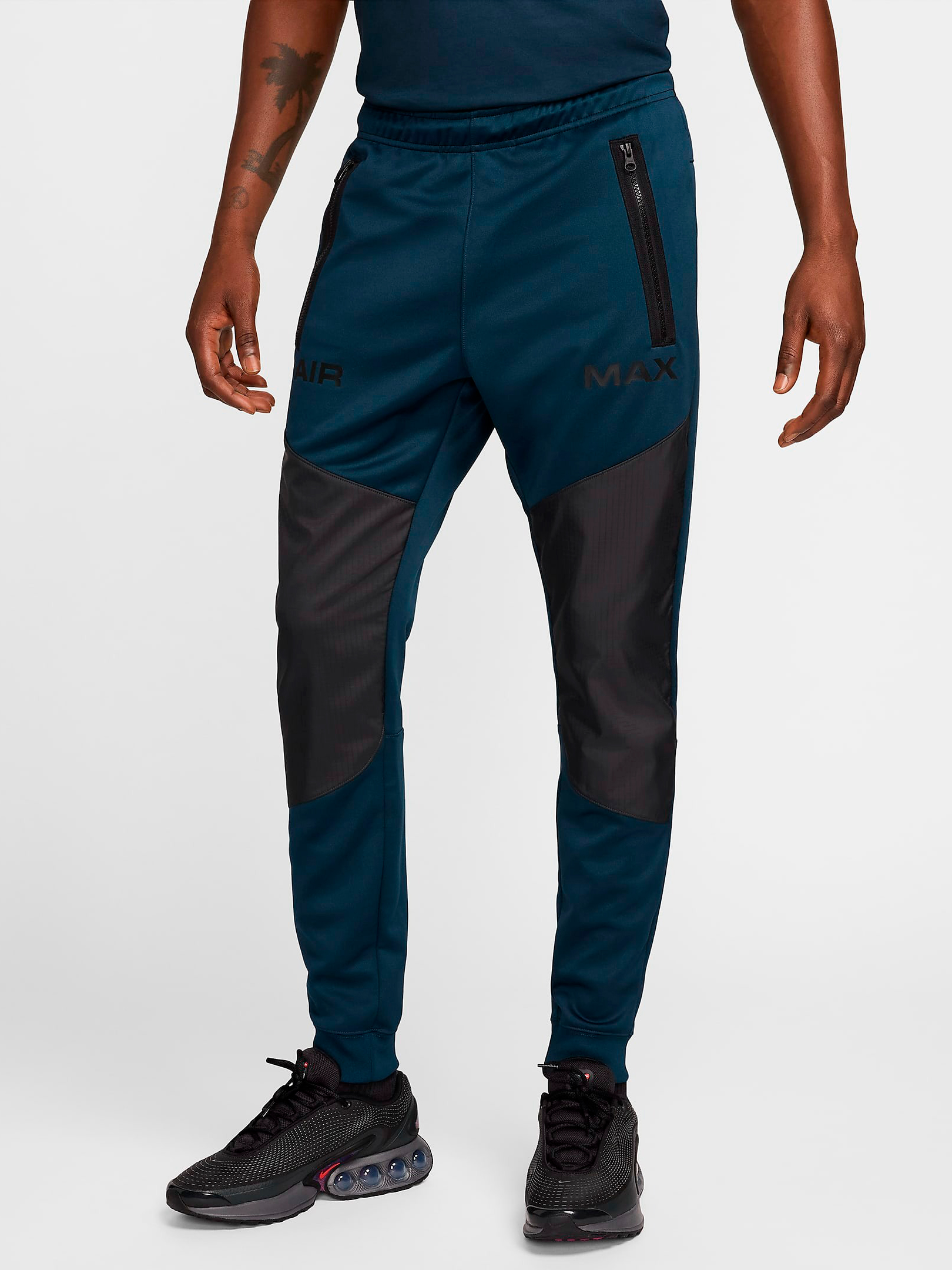 Акція на Спортивні штани чоловічі Nike M Nsw Air Max Pk Jogger HF6599-478 L Зелені від Rozetka