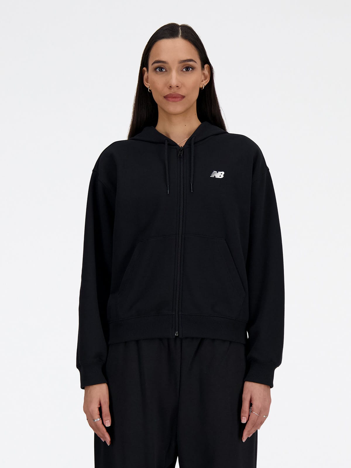 Акція на Толстовка на блискавці утеплена жіноча New Balance Essentials Fleece FZ WJ41502BK M Чорна від Rozetka