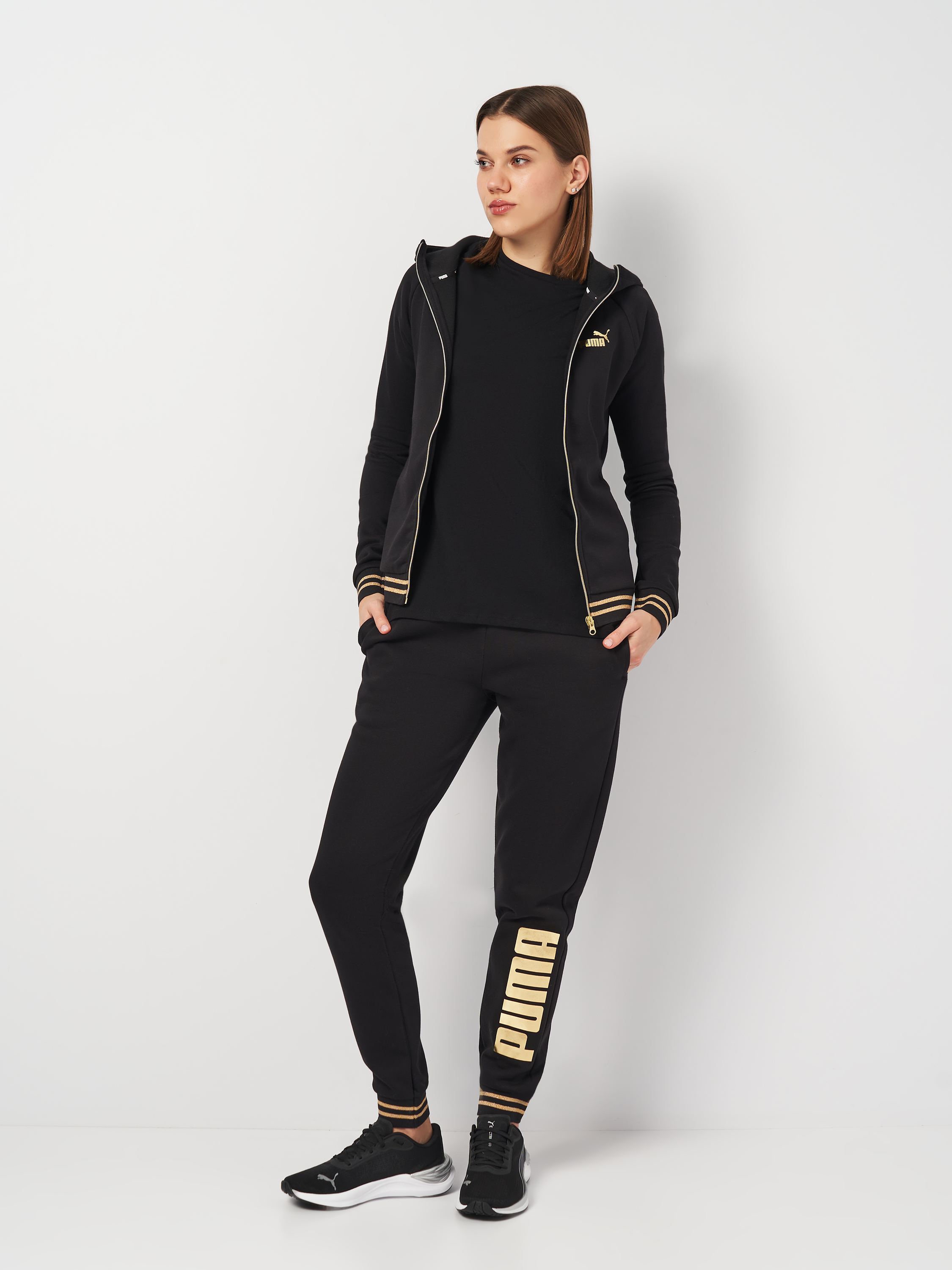 Акція на Спортивний костюм жіночий Puma Tracksuits 84760601 XS Чорний від Rozetka