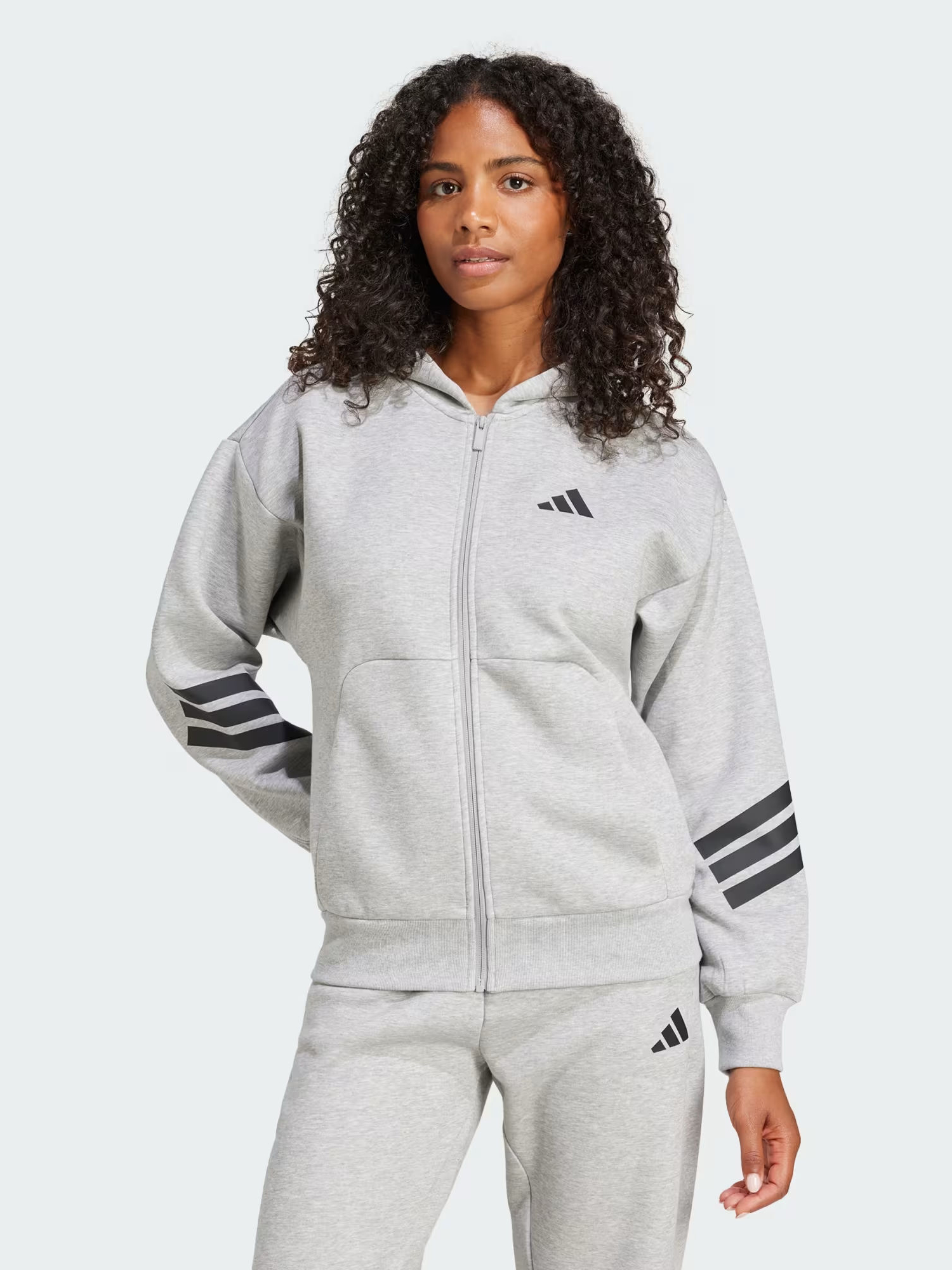 Акція на Толстовка на блискавці з капюшоном жіноча Adidas W Fi 3S Fz Hd JE0172 2XL Mgreyh від Rozetka