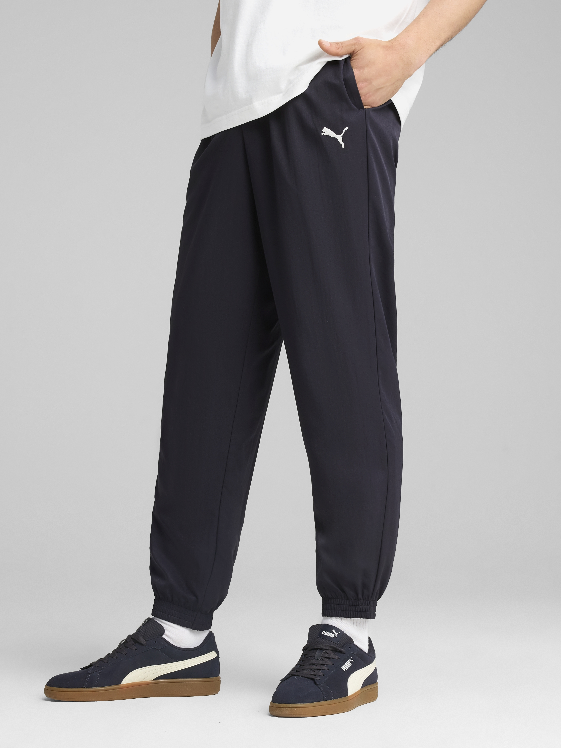 Акція на Спортивні штани чоловічі Puma Ess Woven Pants Cl 68262216 L New Navy від Rozetka