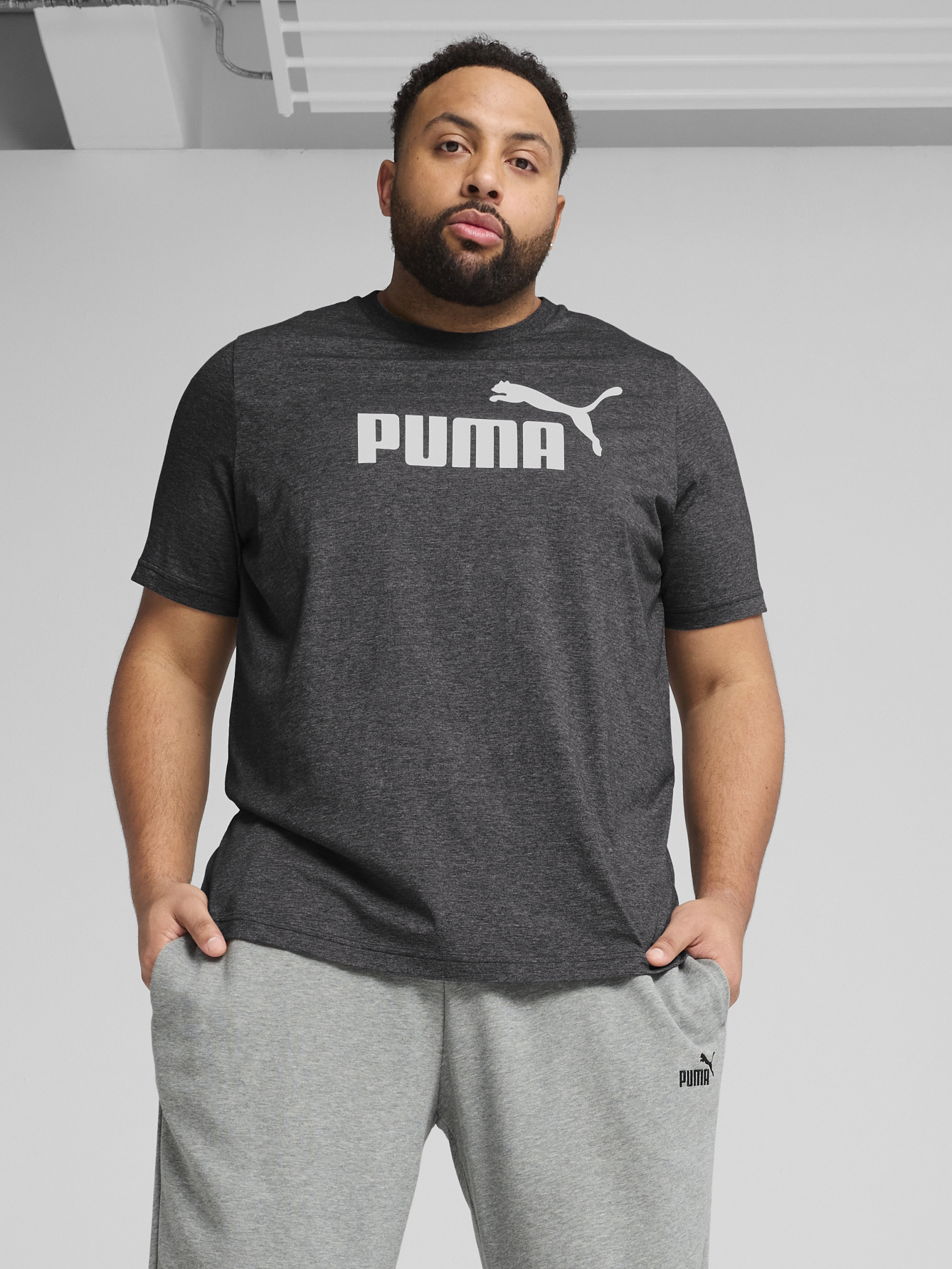 Акція на Футболка бавовняна довга чоловіча Puma Ess No. 1 Logo Heather Tee 68255001 2XL Black з принтом від Rozetka