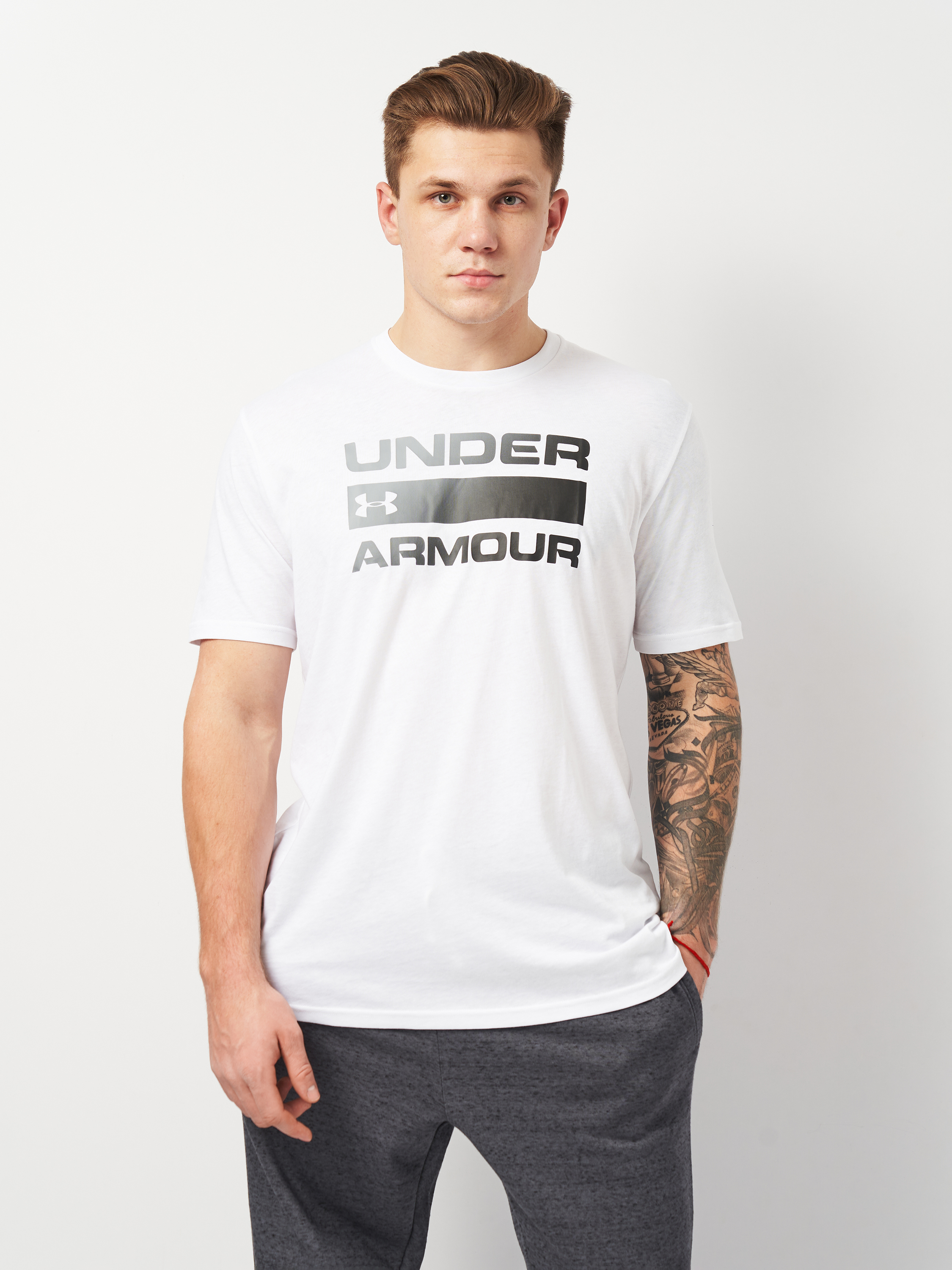 Акція на Футболка довга чоловіча Under Armour Ua Team Issue Wordmark Ss 1329582-100 L Біла з принтом від Rozetka