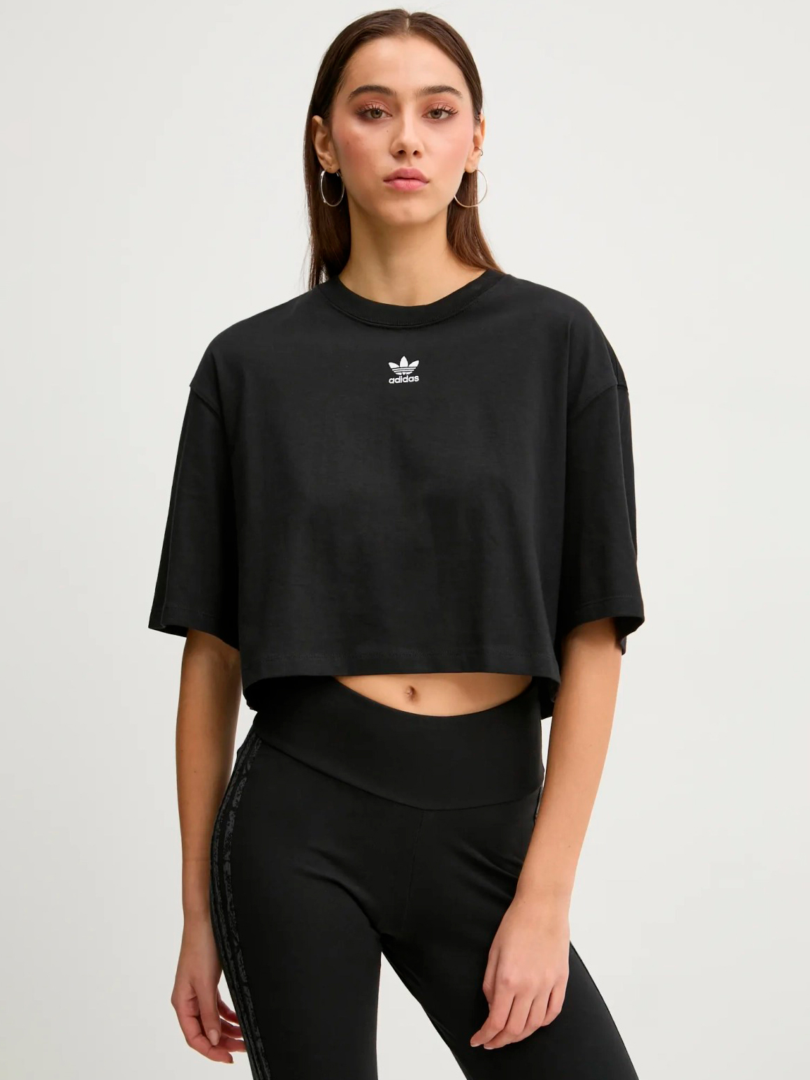 Акція на Футболка бавовняна коротка жіноча Adidas Ess Crop Tee IW5706 XS Black від Rozetka