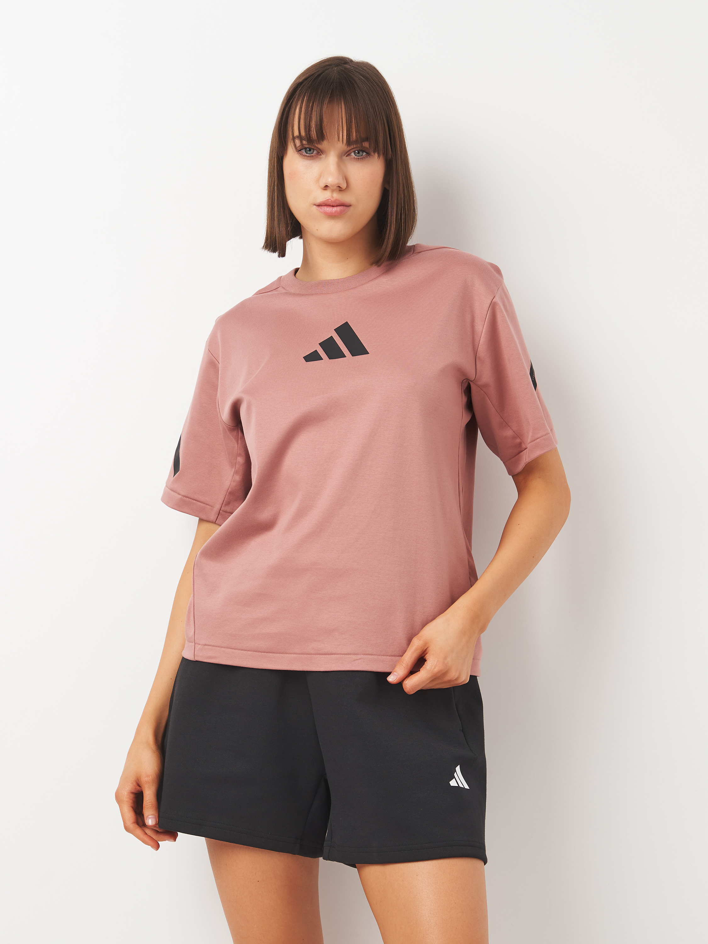 Акція на Футболка бавовняна жіноча Adidas W Z.N.E. Tee JC9311 M Warcla від Rozetka