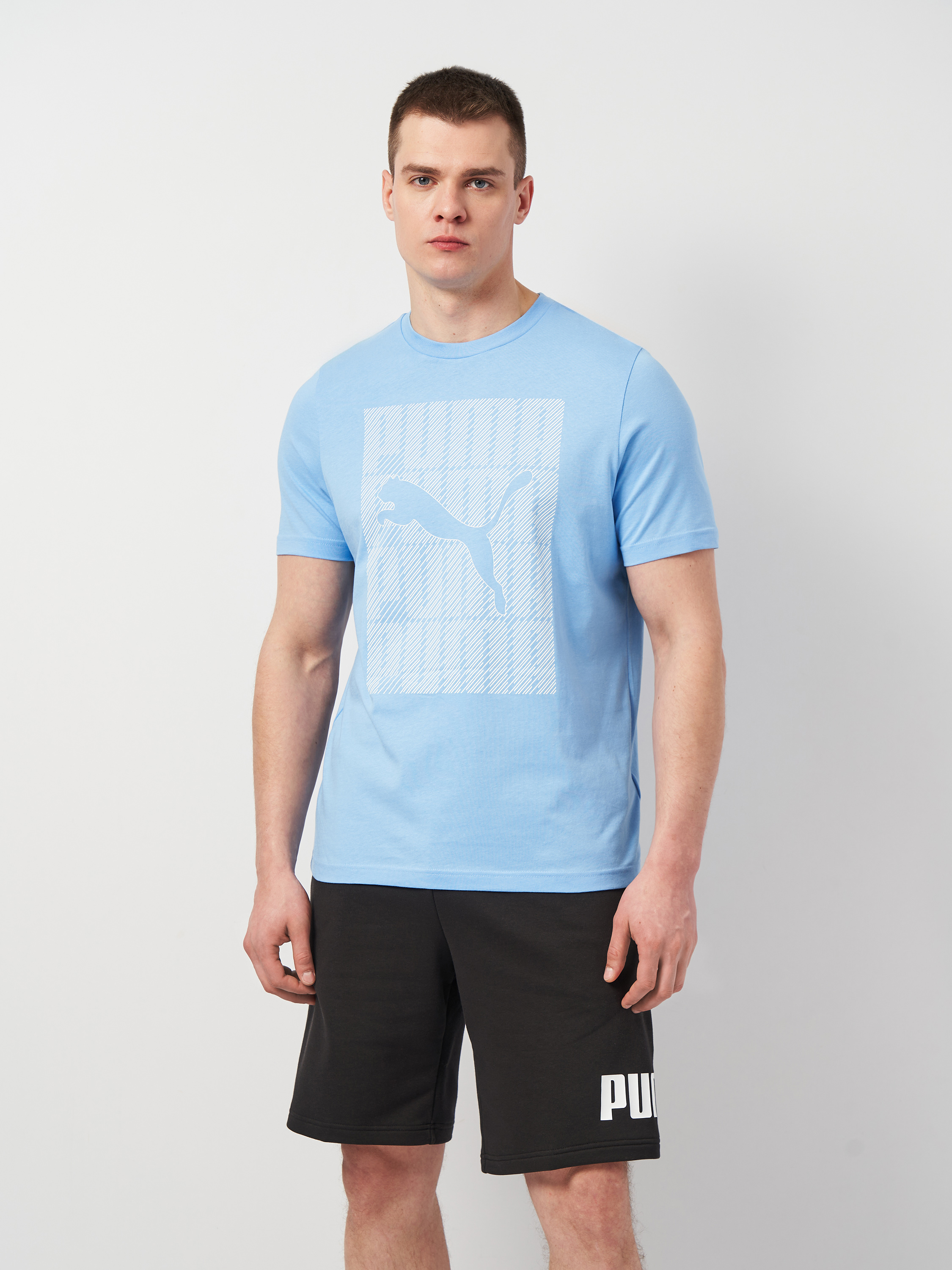 Акція на Футболка бавовняна чоловіча Puma Graphics Wording Tee 68482557 2XL Team Light Blue від Rozetka