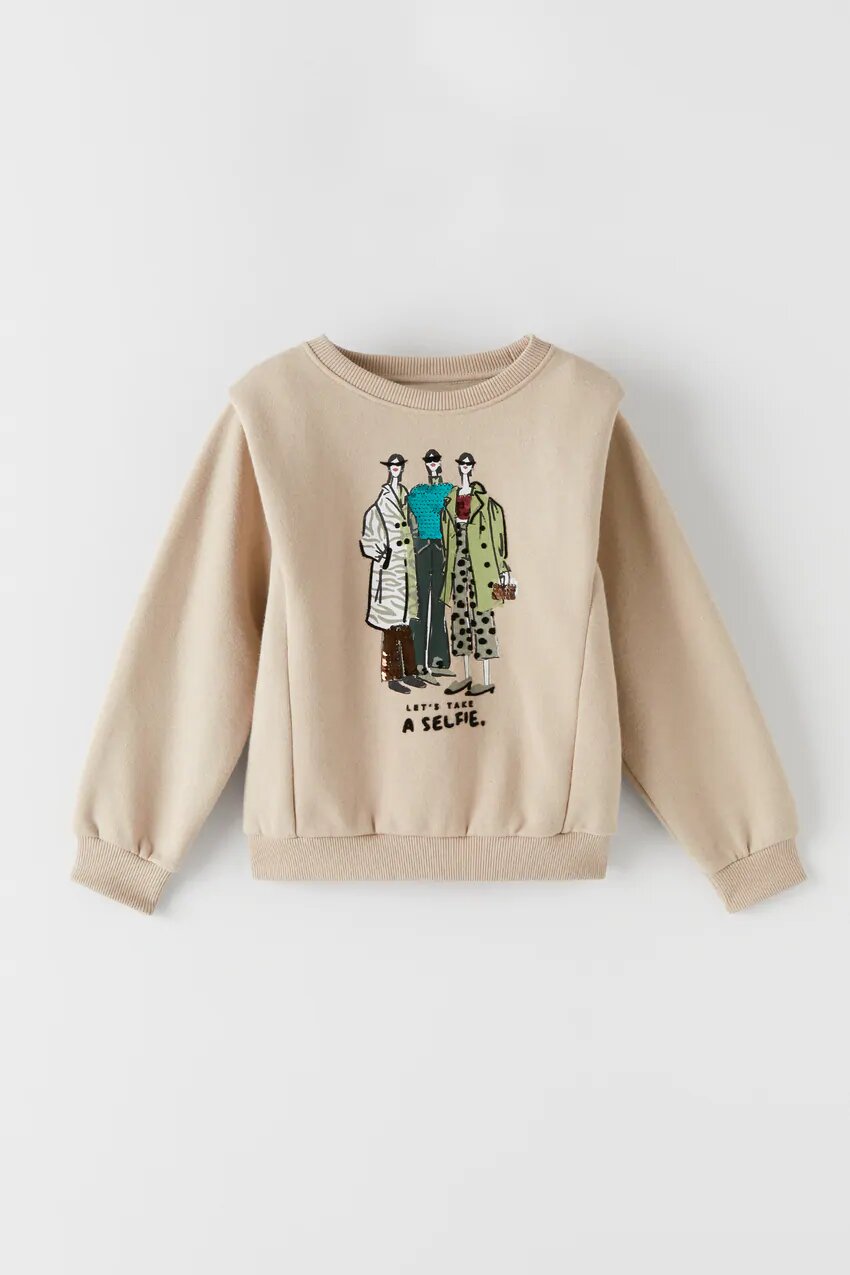 

Світшот із зображенням дівчат Zara Р-3012 128 см Бежевий (P-6910806230615)