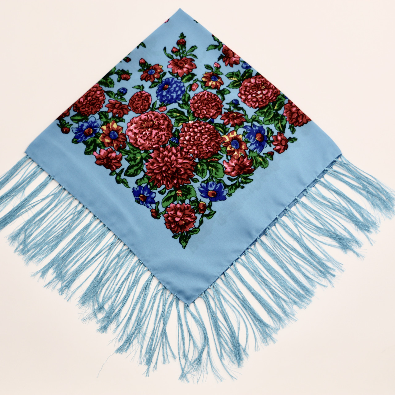 

Хустка вовняна блакитна з квітами т80/186