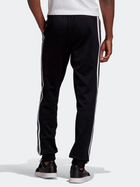 Spodnie Dresowe Adidas Sst GF 0210 L Czarne (4061612985488) - obraz 3