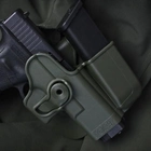 Кобура IMI-Z1023 (GK-3) тактовна полімерна кобура із додатковим магазинним підсумком для Glock 17/22/31/19/23/32/36 (також для Gen.4) Олива (Olive) - зображення 1
