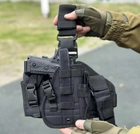 Настегнана тактична кобура для пістолета Tactic універсальна кобура на пояс з кишенею під магазин Чорний (holster-1019-black) - зображення 1