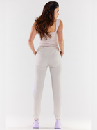 Spodnie dresowe damskie Awama A498 1419342 XL Beżowy/Fioletowy (5902360568983) - obraz 2