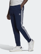 Spodnie dresowe męskie Adidas HK7353 S Niebieski/Biały (4065415095979) - obraz 1