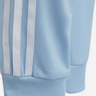 Dziecięce spodnie dresowe dla dziewczynki Adidas Superstar Pants DV2882 134 cm Błękitne (4060515196847) - obraz 4