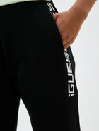 Спортивні штани жіночі Guess V3RB10K68I3 M Чорні (7619342755153) - зображення 4