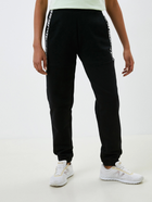 Спортивні штани жіночі Guess V3RB10K68I3 XL Чорні (7619342755177) - зображення 1