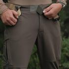 Мужские влагозащищенные брюки с карманами олива размер XL - изображение 4