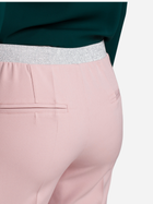 Spodnie slim fit damskie Makover K035 XL Różowe (5903068462528) - obraz 4