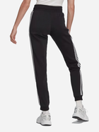 Spodnie dresowe damskie Adidas Adicolor Classics IB7455 M Czarne (4066752058108) - obraz 2