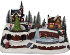 Ruchoma scenka świąteczna Christmas Decoration Lodowisko 41 cm (8719987961915)